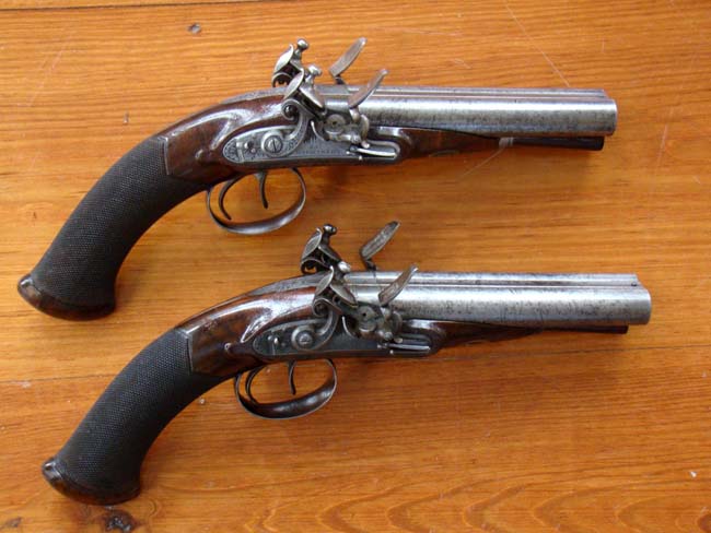 A fine pair of Double Barreled English Flintlock Coach Pistols by James Wilkinson, London, circa 1810, Gunmaker to His Majesty King George III.